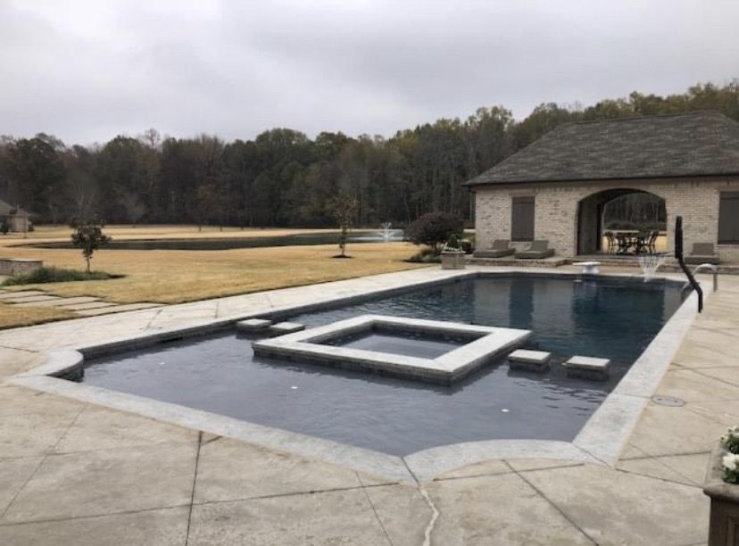Geometric pool with raised spa and stamped concrete — Nashville, TN