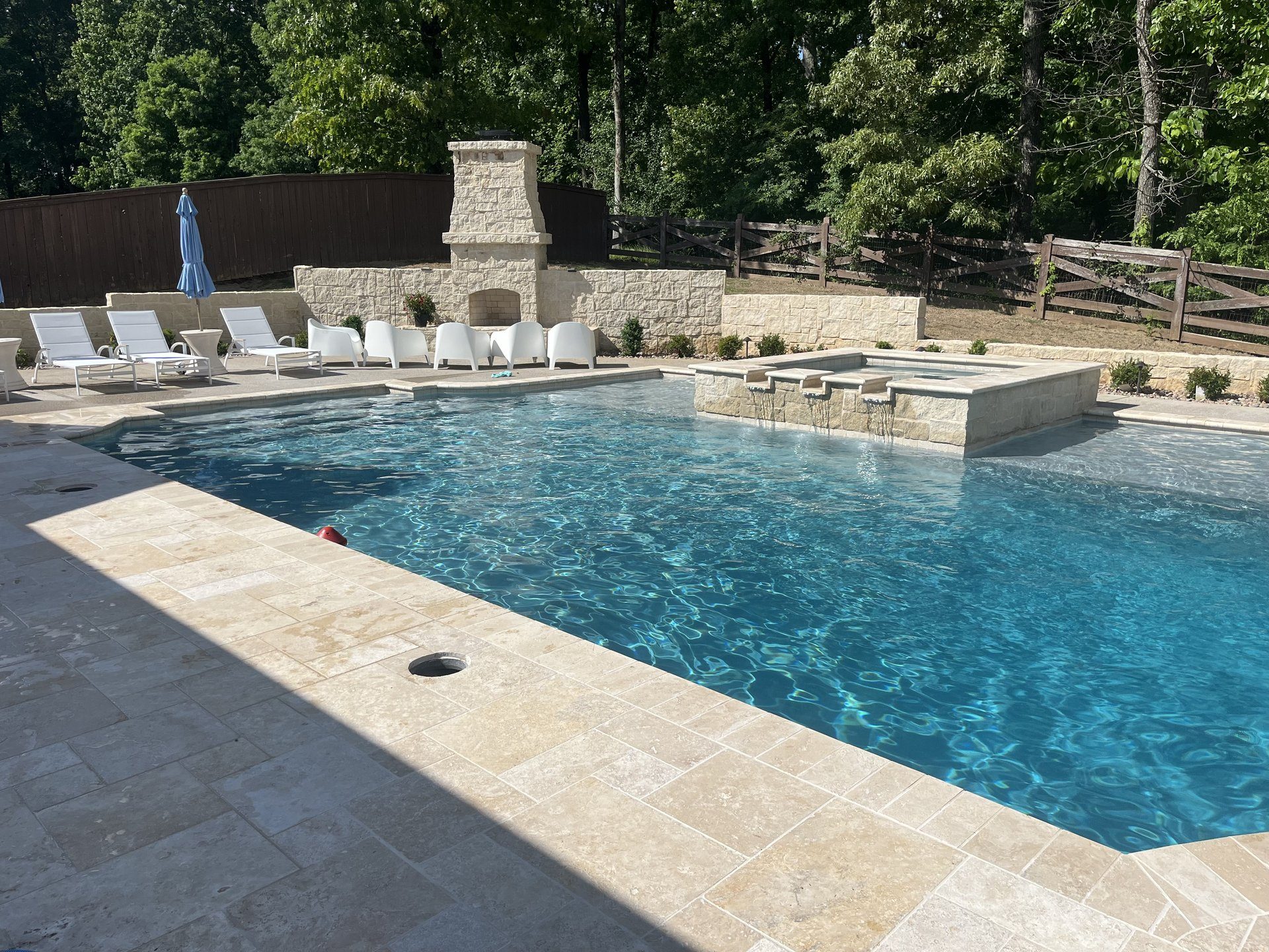 Travertine deck, spa and fireplace renovation — Brentwood, TN